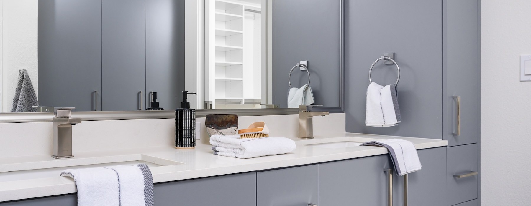 Bathroom options with thoughtful details a bathroom with a large mirror