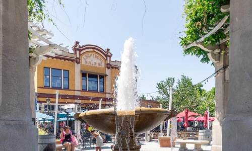 a water fountain in a city court
