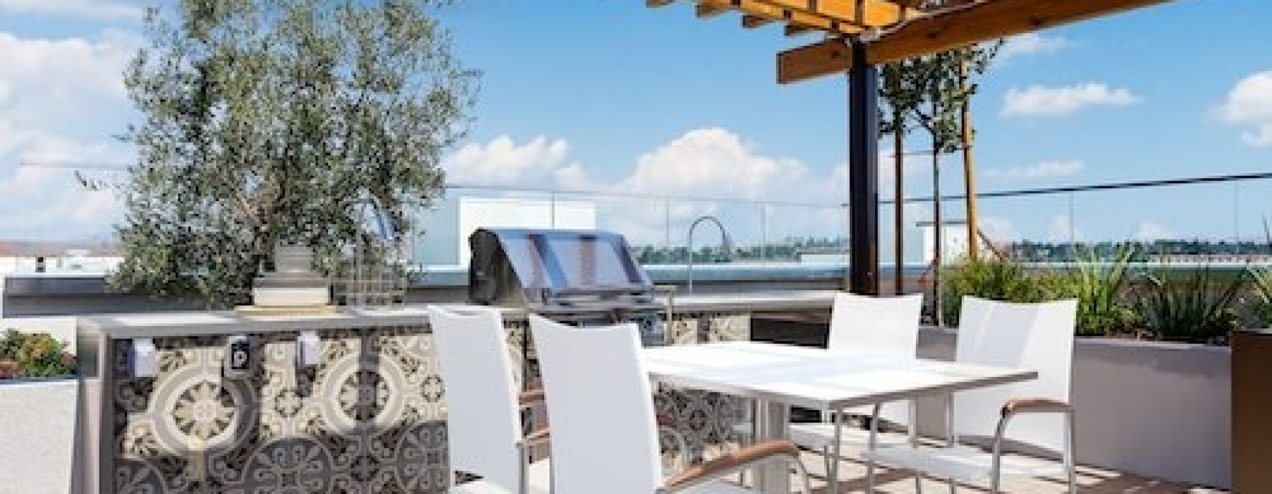 a grill area with a table and chairs at Legacy at Livermore
