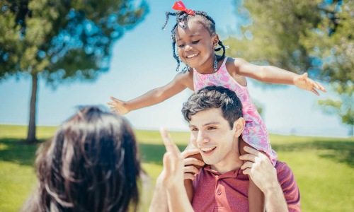 a group of people in a park