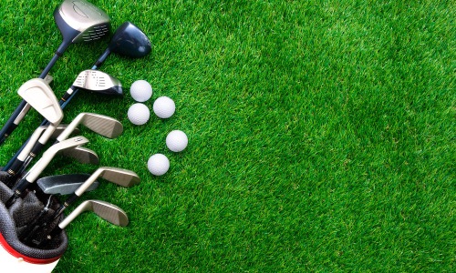 a golf course with golf equipment