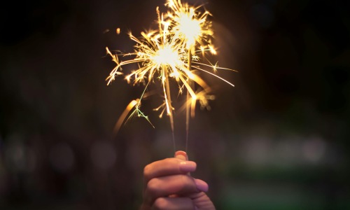 a person holding fireworks