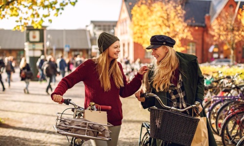 two women with bikes